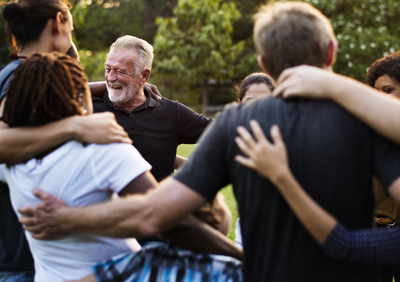 Photo of group of volunteers congratulating each other