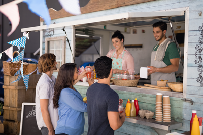 photo of people working in food concession stand